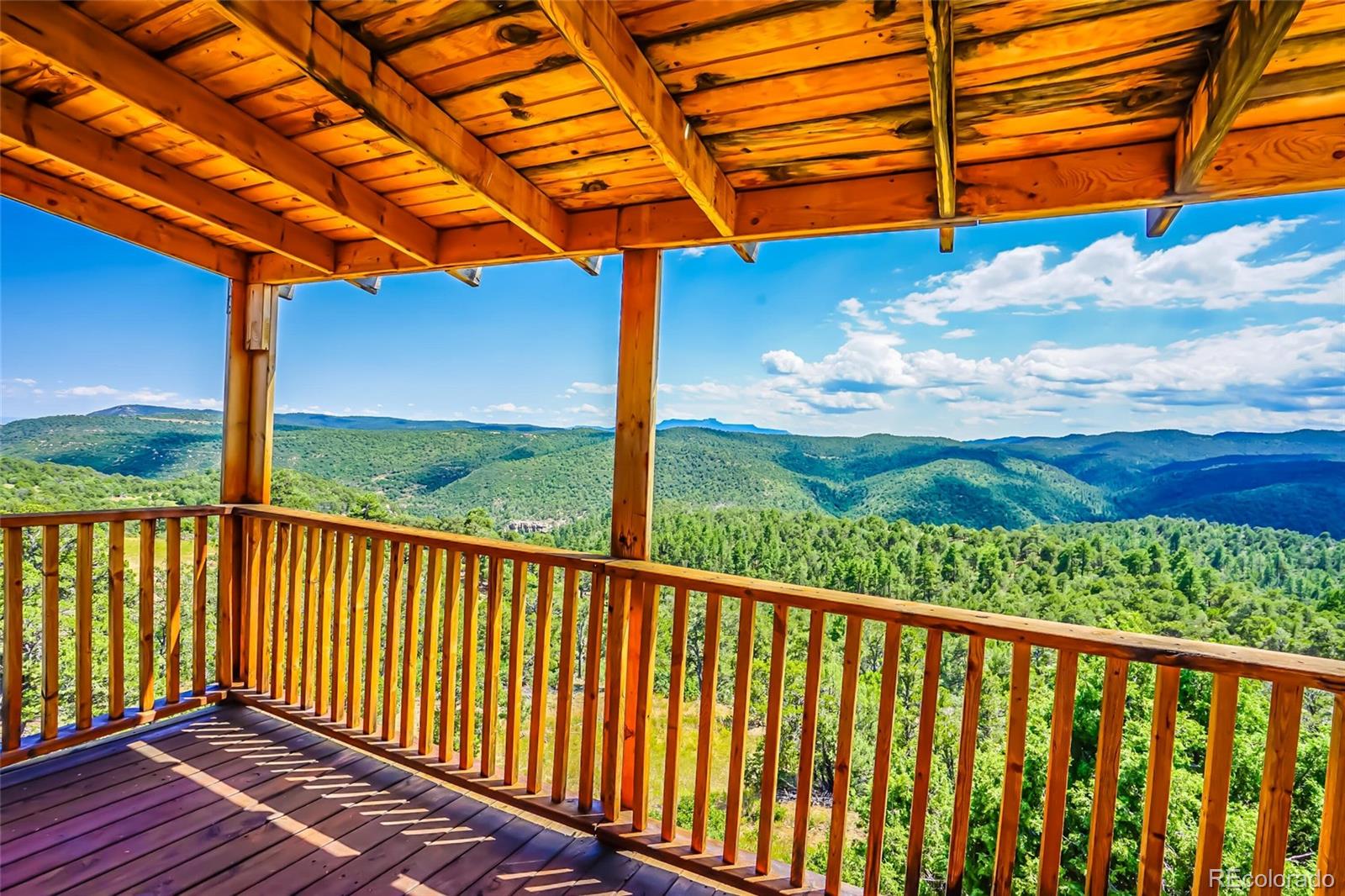 31300 Timber Canyon Road Trinidad, CO 81082 - Photo 4 of 50 a view of a balcony with a swing