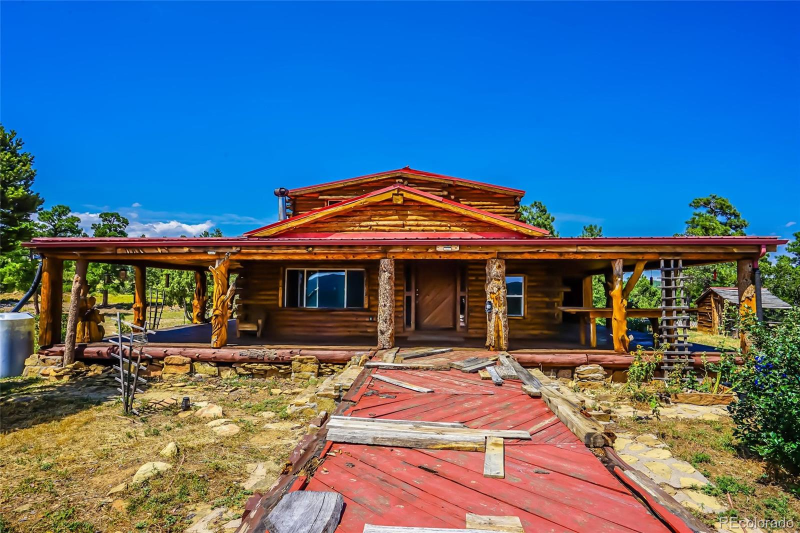 31300 Timber Canyon Road Trinidad, CO 81082 - Photo 48 of 50 a front view of a house with yard
