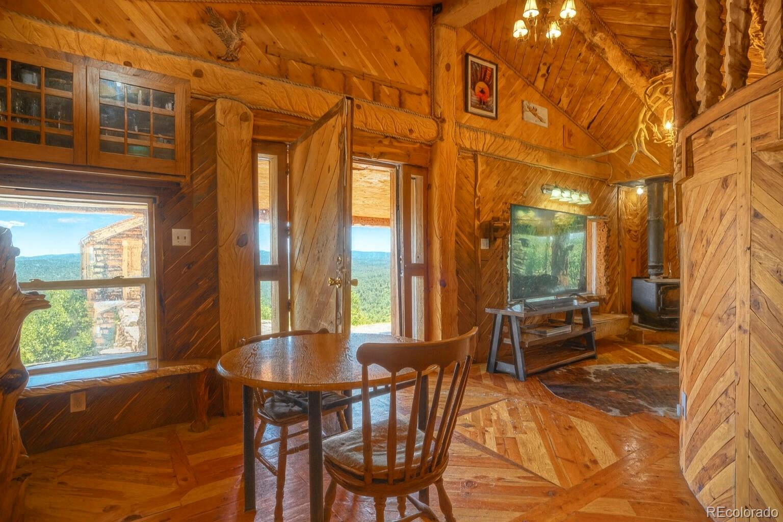 31300 Timber Canyon Road Trinidad, CO 81082 - Photo 9 of 50 a view of a patio with a table chairs and backyard
