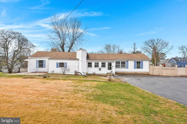 a front view of a house with swimming pool