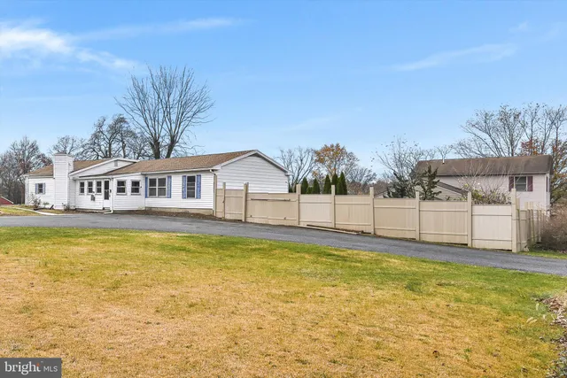 a view of a house with a swimming pool