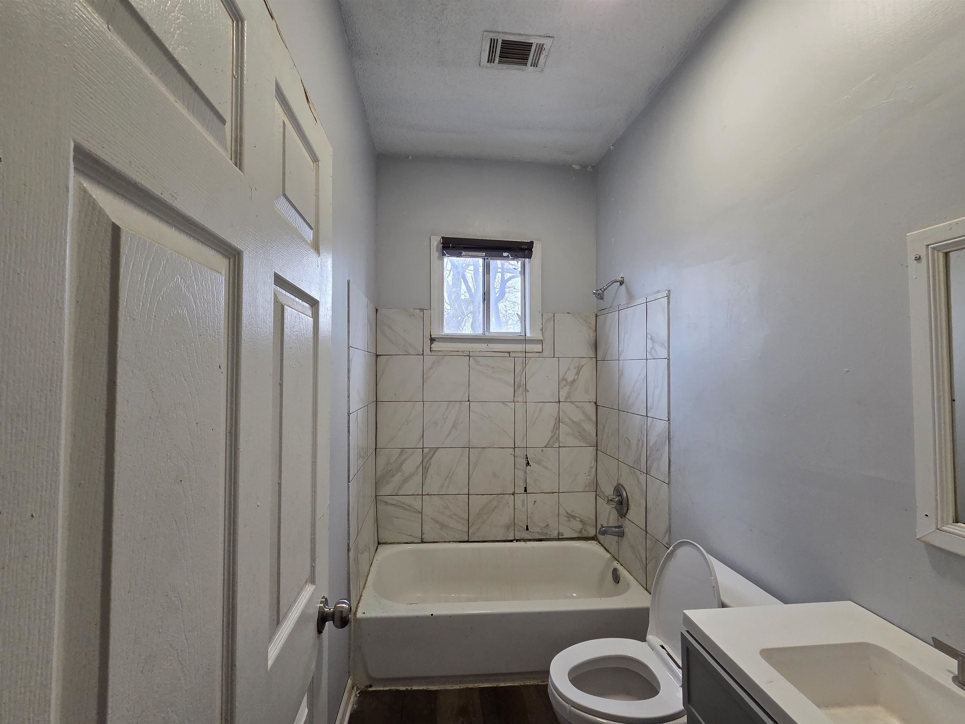 993 Oakview Street, Unit 201 Memphis, TN 38114 - Photo 16 of 16 a bathroom with a tub and a sink