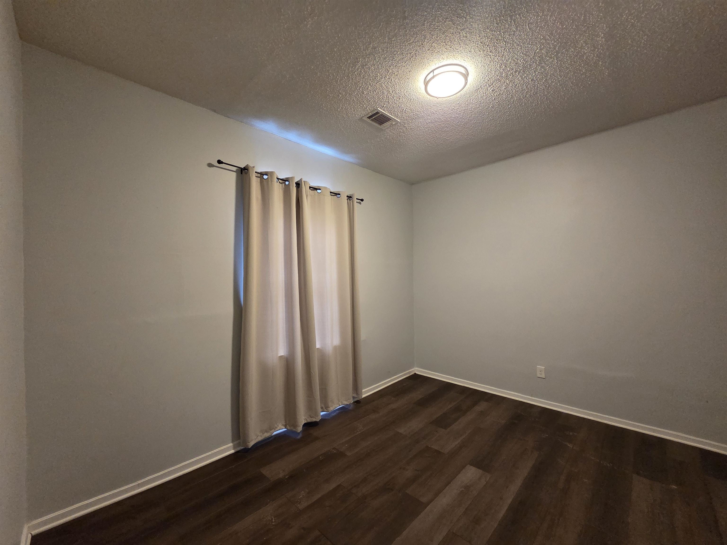 993 Oakview Street, Unit 201 Memphis, TN 38114 - Photo 2 of 16 a view of an empty room