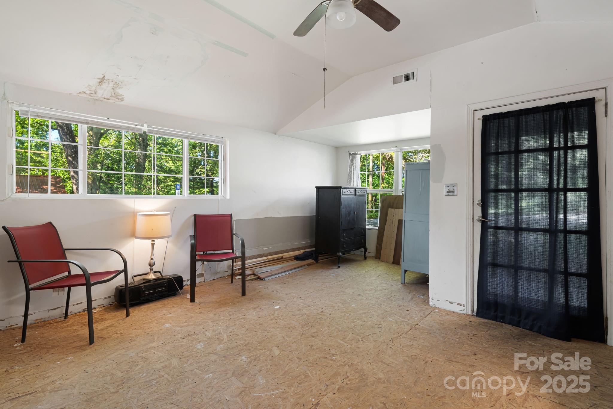 609 Maple Street Brevard, NC 28712 - Photo 13 of 28 a view of a livingroom with furniture and a window