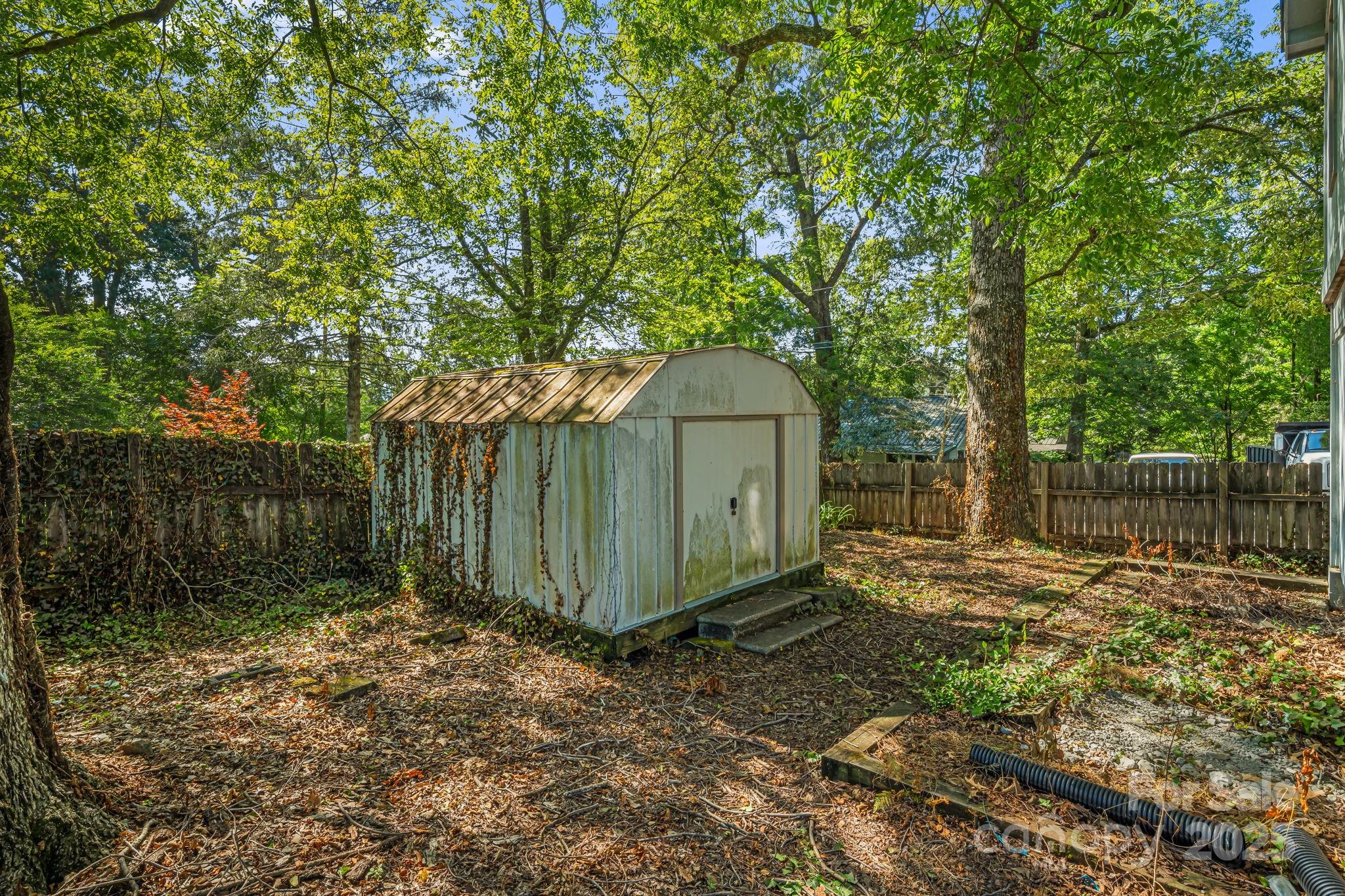 609 Maple Street Brevard, NC 28712 - Photo 24 of 28 a view of a backyard