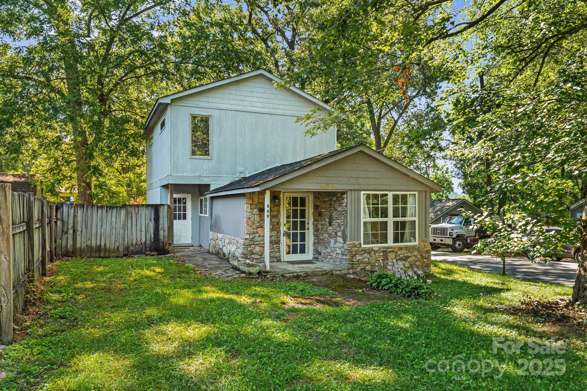 609 Maple Street Brevard, NC 28712 - Photo 27 of 28 a front view of a house with garden