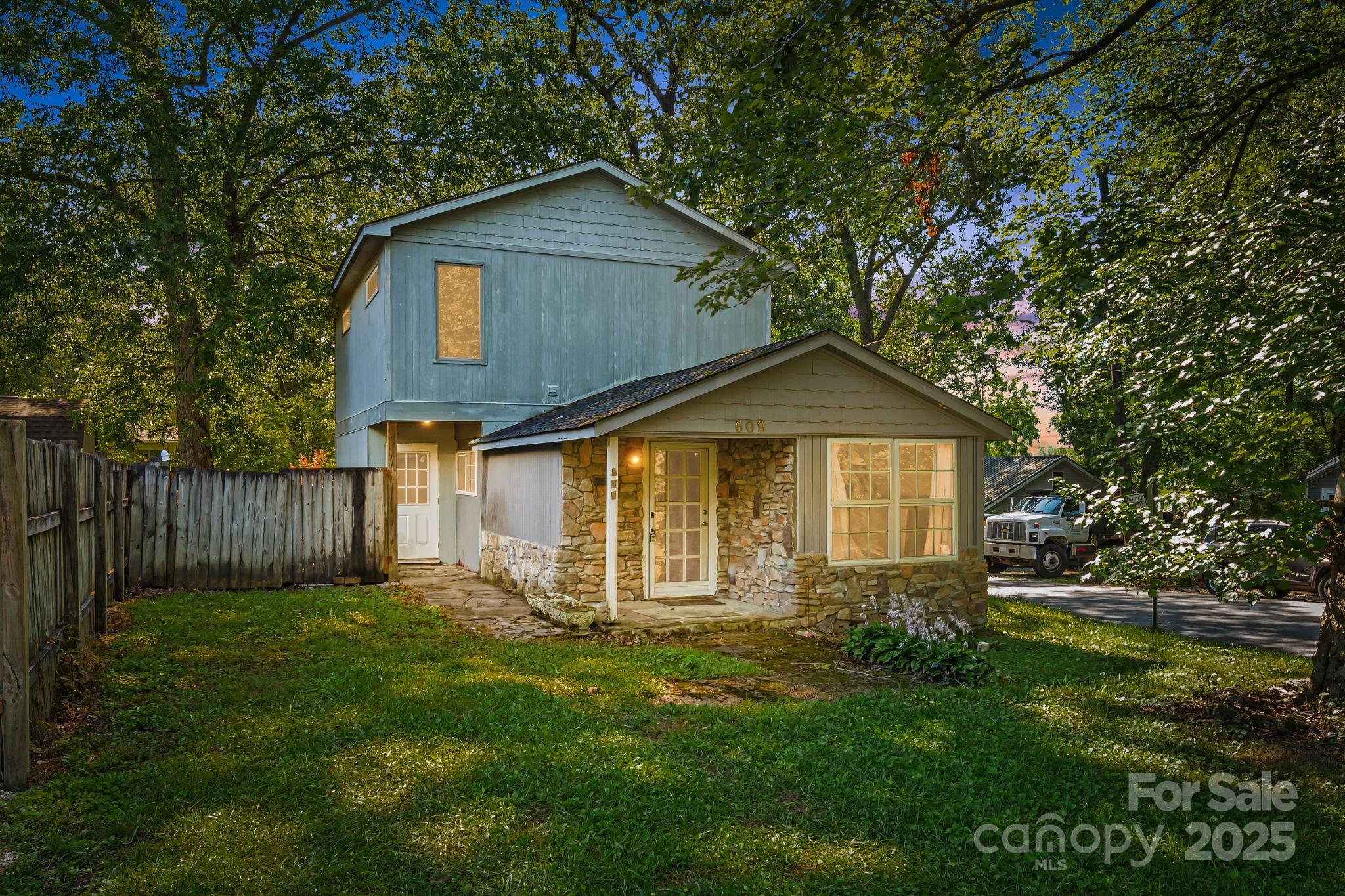 609 Maple Street Brevard, NC 28712 - Photo 28 of 28 a front view of a house with yard and green space