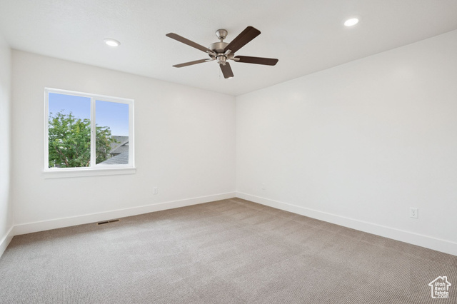 1615 North Angel Street, Unit H Layton, UT 84041 - Photo 27 of 55 Unfurnished room featuring light carpet, recessed lighting, and ceiling fan