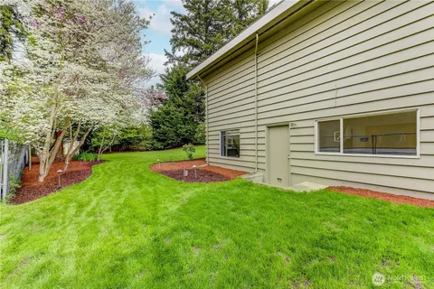 a view of a backyard with a garden