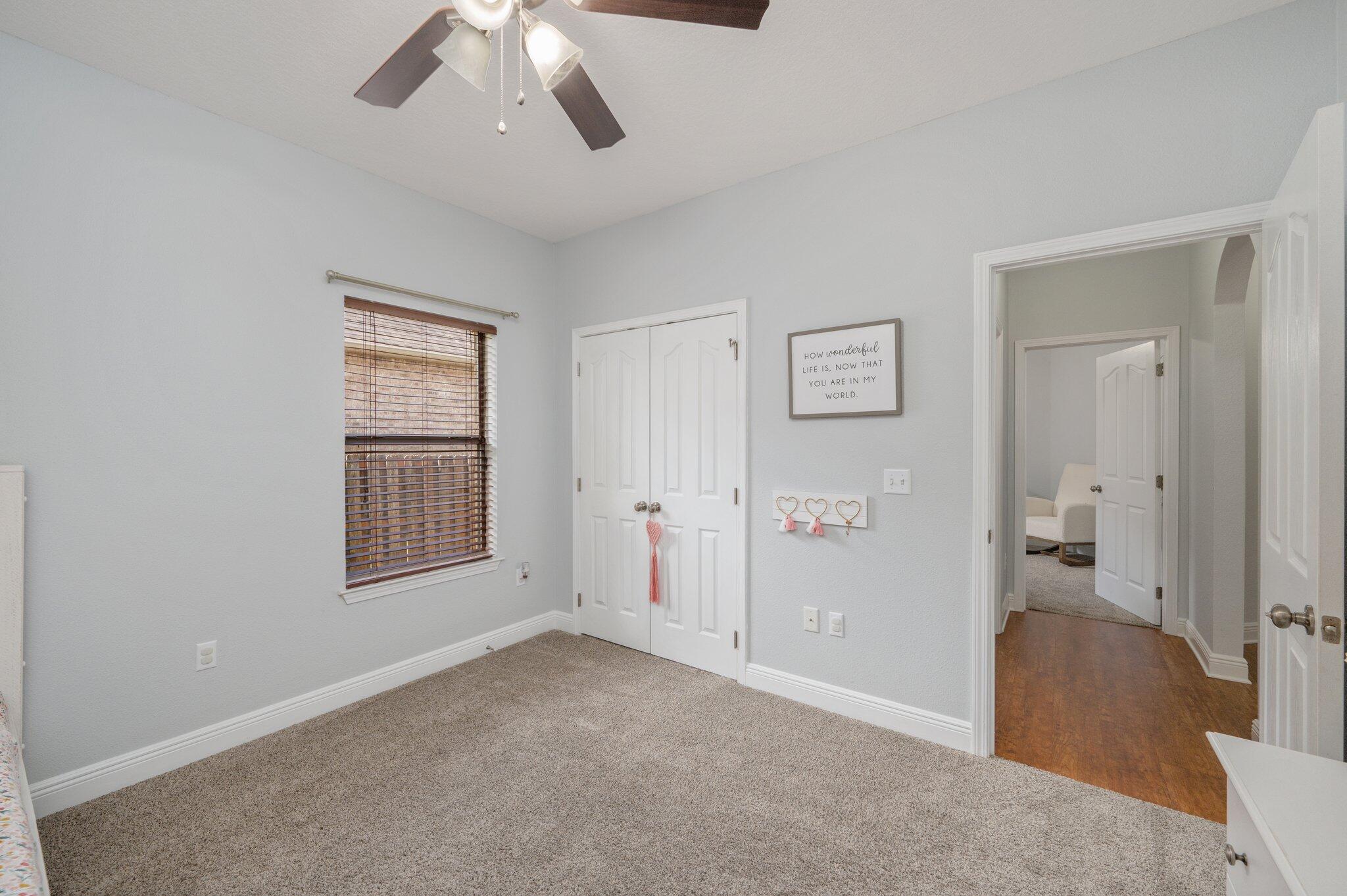 661 Red Fern Road Crestview, FL 32536 - Photo 14 of 28 an empty room with windows and closet