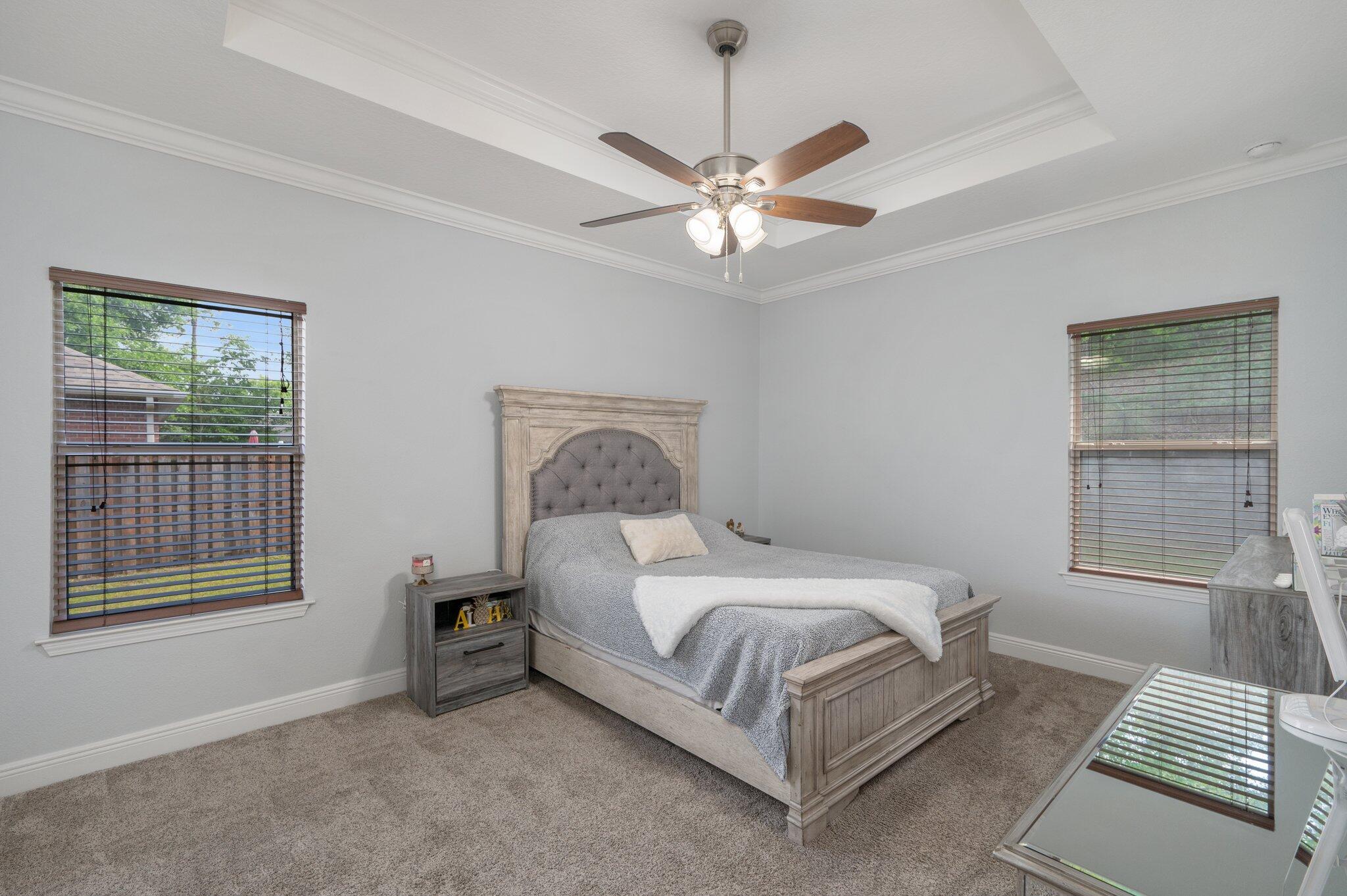 661 Red Fern Road Crestview, FL 32536 - Photo 17 of 28 a bedroom with a bed and a window