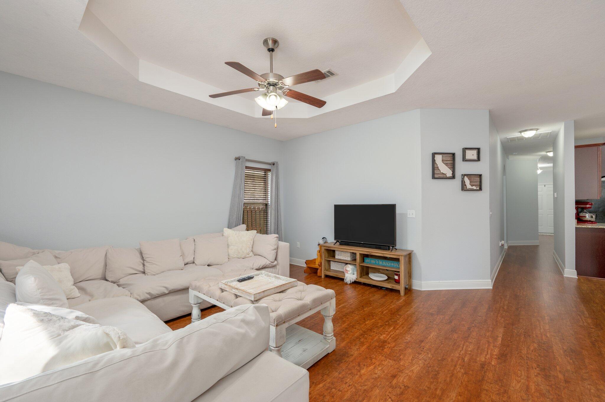 661 Red Fern Road Crestview, FL 32536 - Photo 3 of 28 a living room with furniture and a flat screen tv