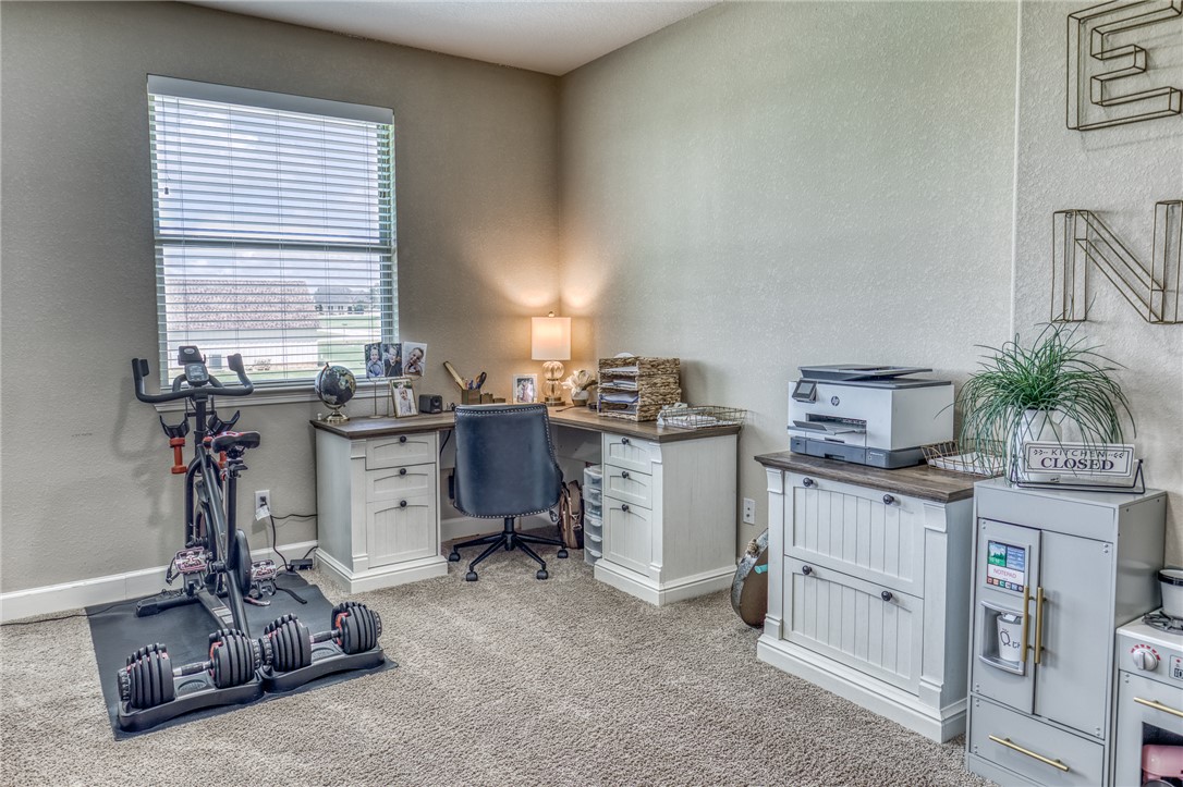 586 Ruby Drive Bellville, TX 77418 - Photo 22 of 50 a view of a room with gym equipment