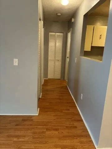 a bathroom with a sink toilet and mirror