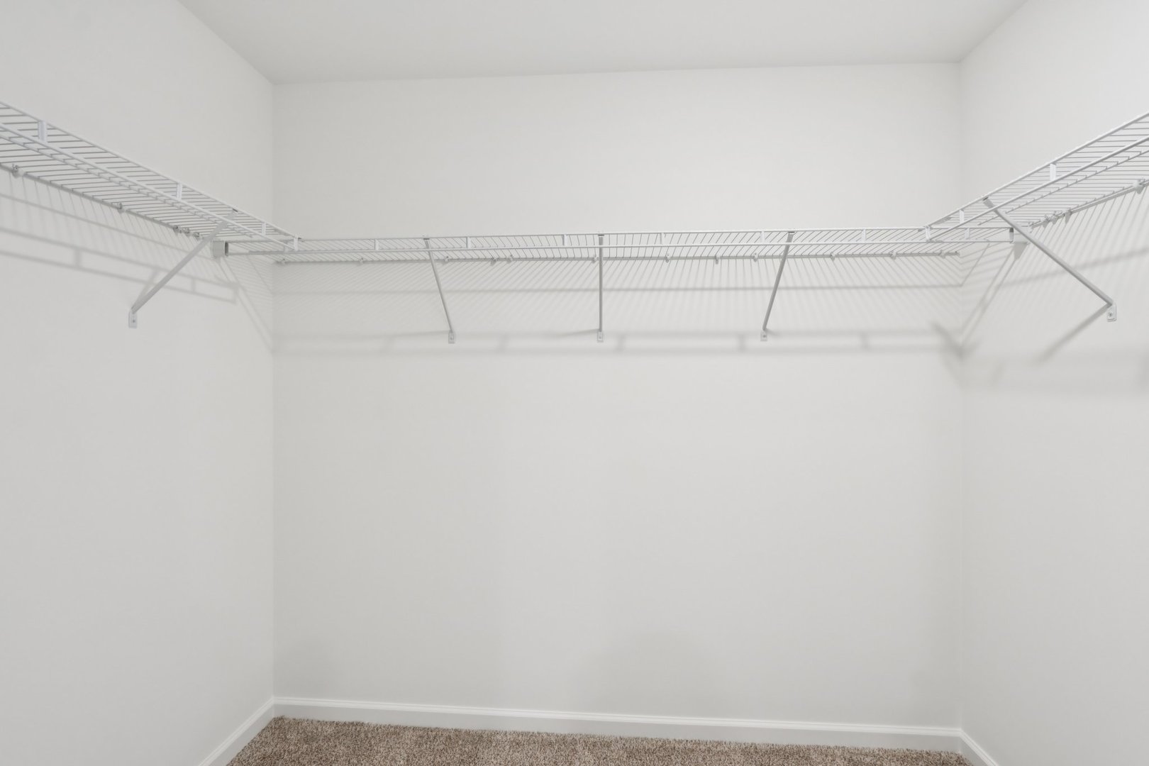 2937 Rushmore Drive Pingree Grove, IL 60140 - Photo 17 of 36 a view of a rack on the wall