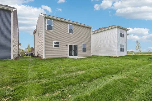 a view of a back yard of the house
