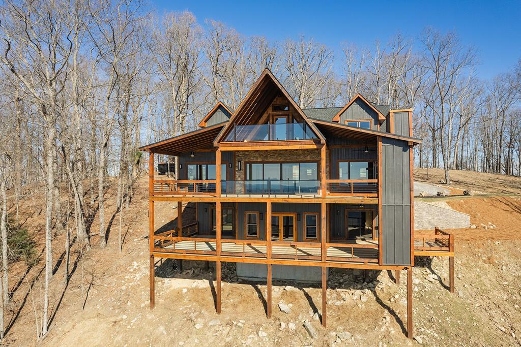 925 Heards Ridge Morganton, GA 30560 - Photo 2 of 70 a front view of a house with a porch