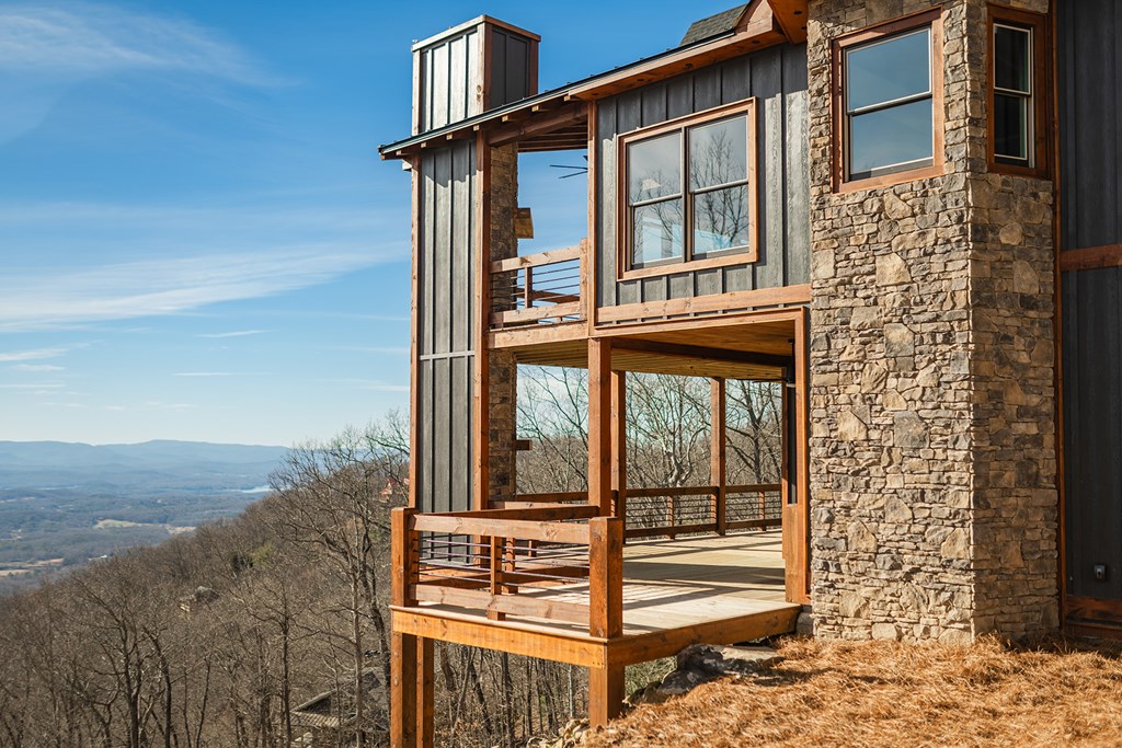 925 Heards Ridge Morganton, GA 30560 - Photo 7 of 70 front view of a house with a balcony