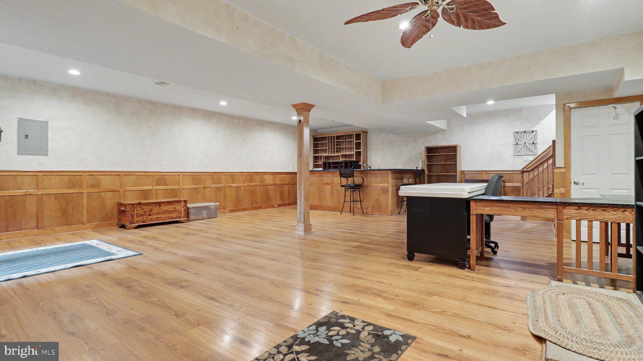 2113 Courthouse Road Catlett, VA 20119 - Photo 62 of 87 Spacious basement with warm wood accents.