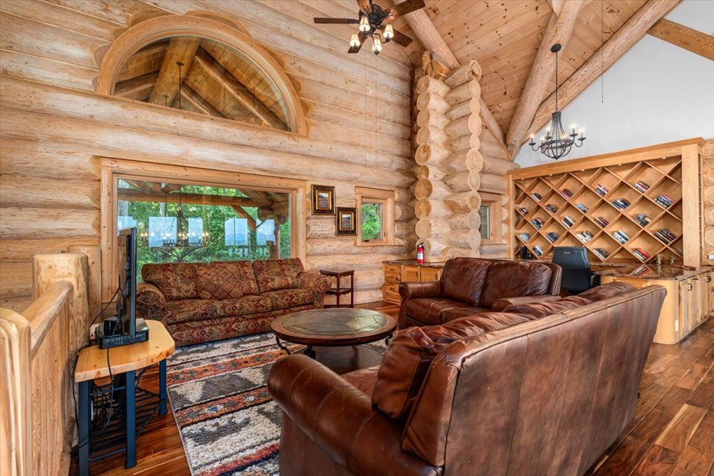 373 Rising Star Lane Mineral Bluff, GA 30559 - Photo 70 of 98 a living room with furniture and a large window
