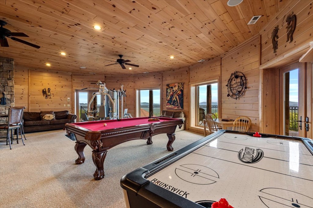 373 Rising Star Lane Mineral Bluff, GA 30559 - Photo 84 of 98 a room with furniture pool table flat screen tv and windows