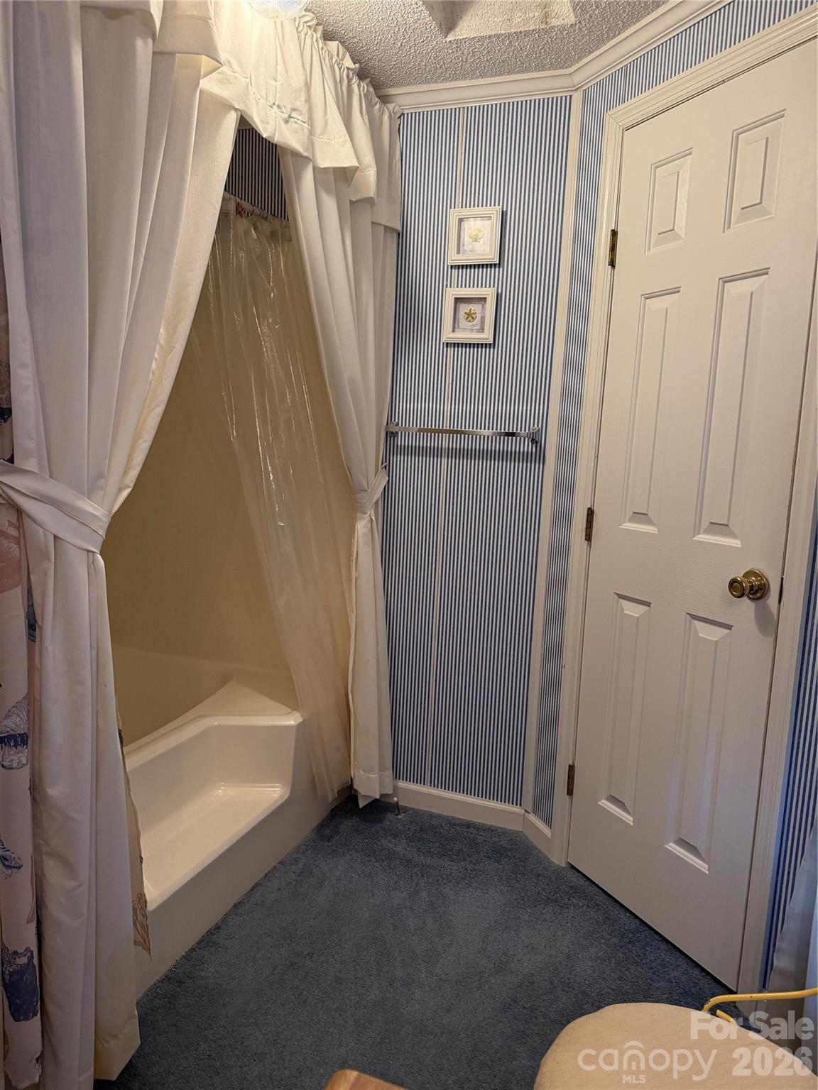 367 High Point Church Road Pageland, SC 29728 - Photo 11 of 17 a bathroom with a tub and a shower