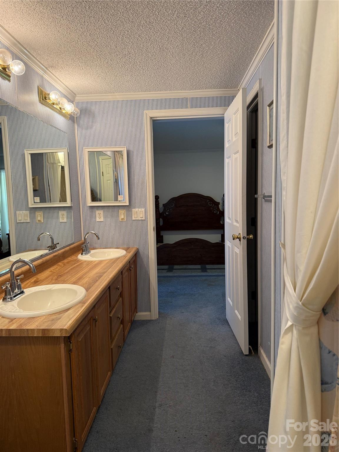 367 High Point Church Road Pageland, SC 29728 - Photo 12 of 17 a en suite bathroom with a granite countertop sink and a large mirror