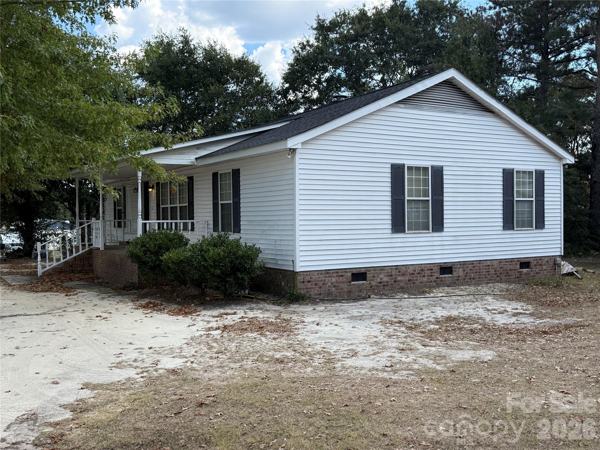 367 High Point Church Road Pageland, SC 29728 - Photo 2 of 17 a view of a house with a yard
