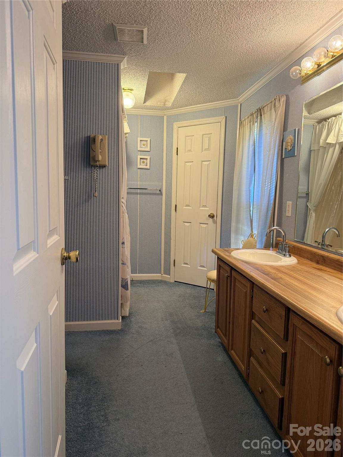 367 High Point Church Road Pageland, SC 29728 - Photo 10 of 17 a bathroom with a granite countertop sink mirror and a