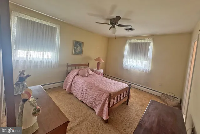 a view of walk in closet with window