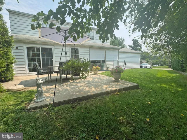 a vase of flowers sitting on a table