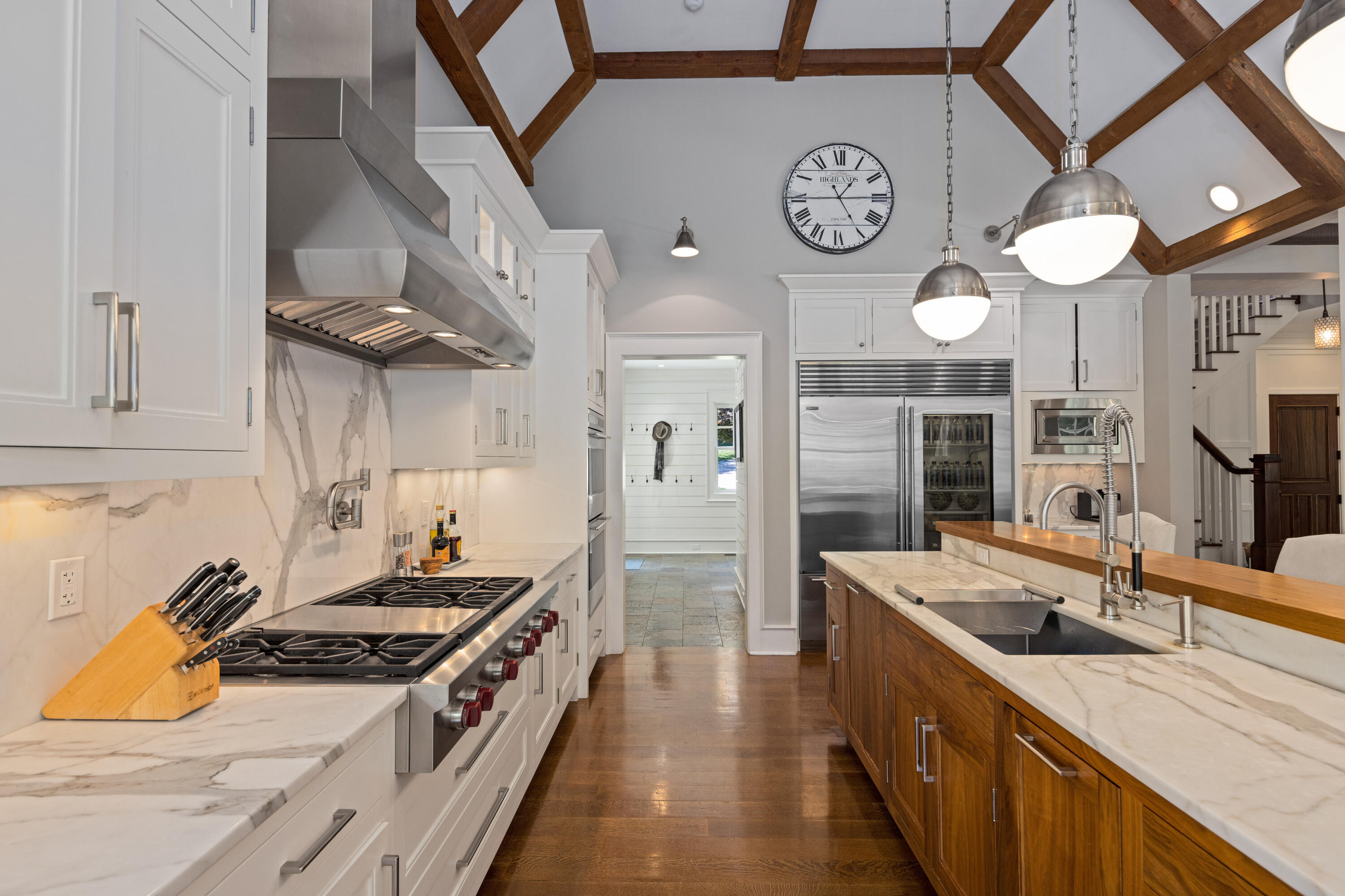 163 Chichester Road New Canaan, CT 06840 - Photo 11 of 40 a kitchen with stainless steel appliances a stove a sink and a refrigerator