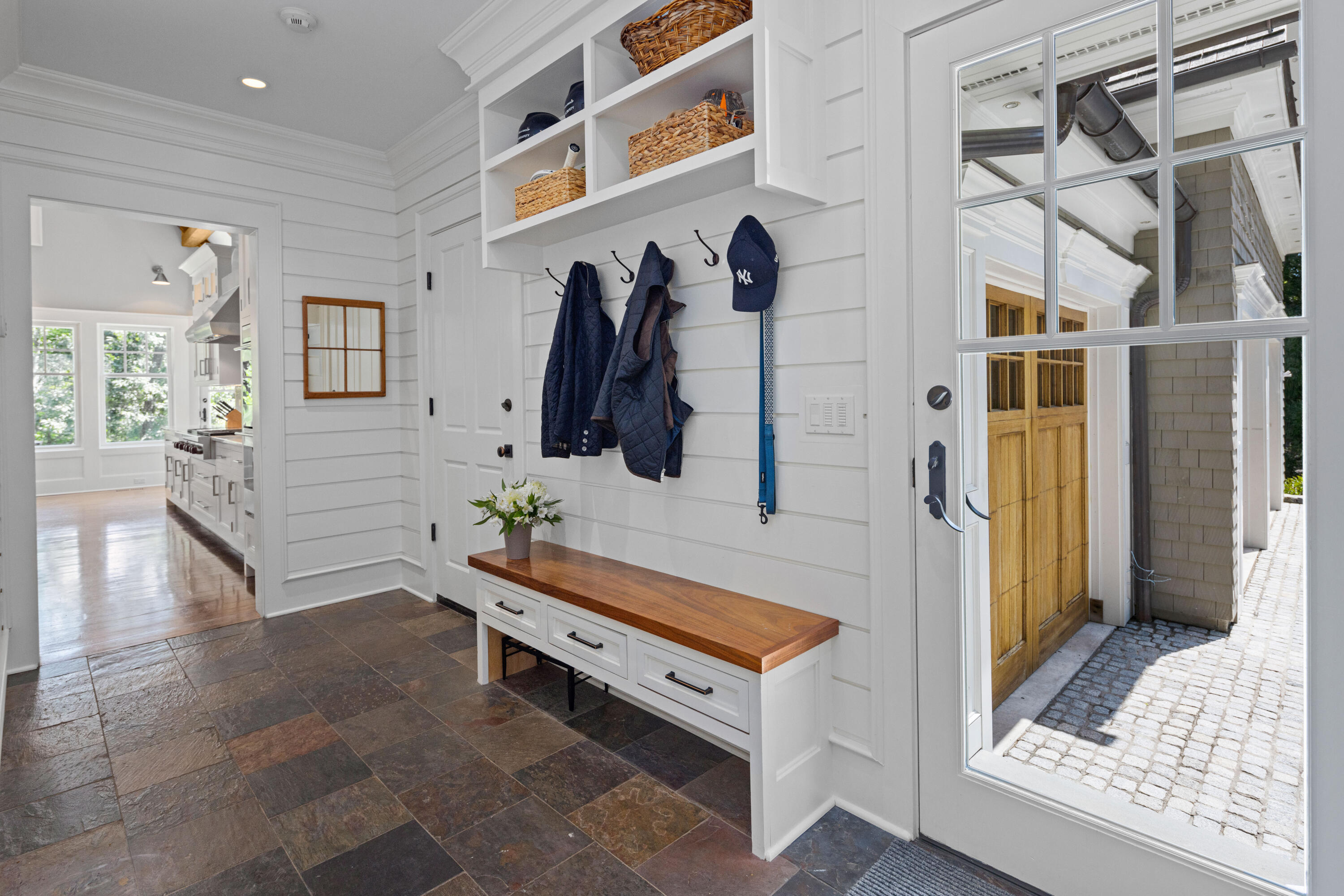 163 Chichester Road New Canaan, CT 06840 - Photo 14 of 40 a room with lots of white furniture and wooden floor