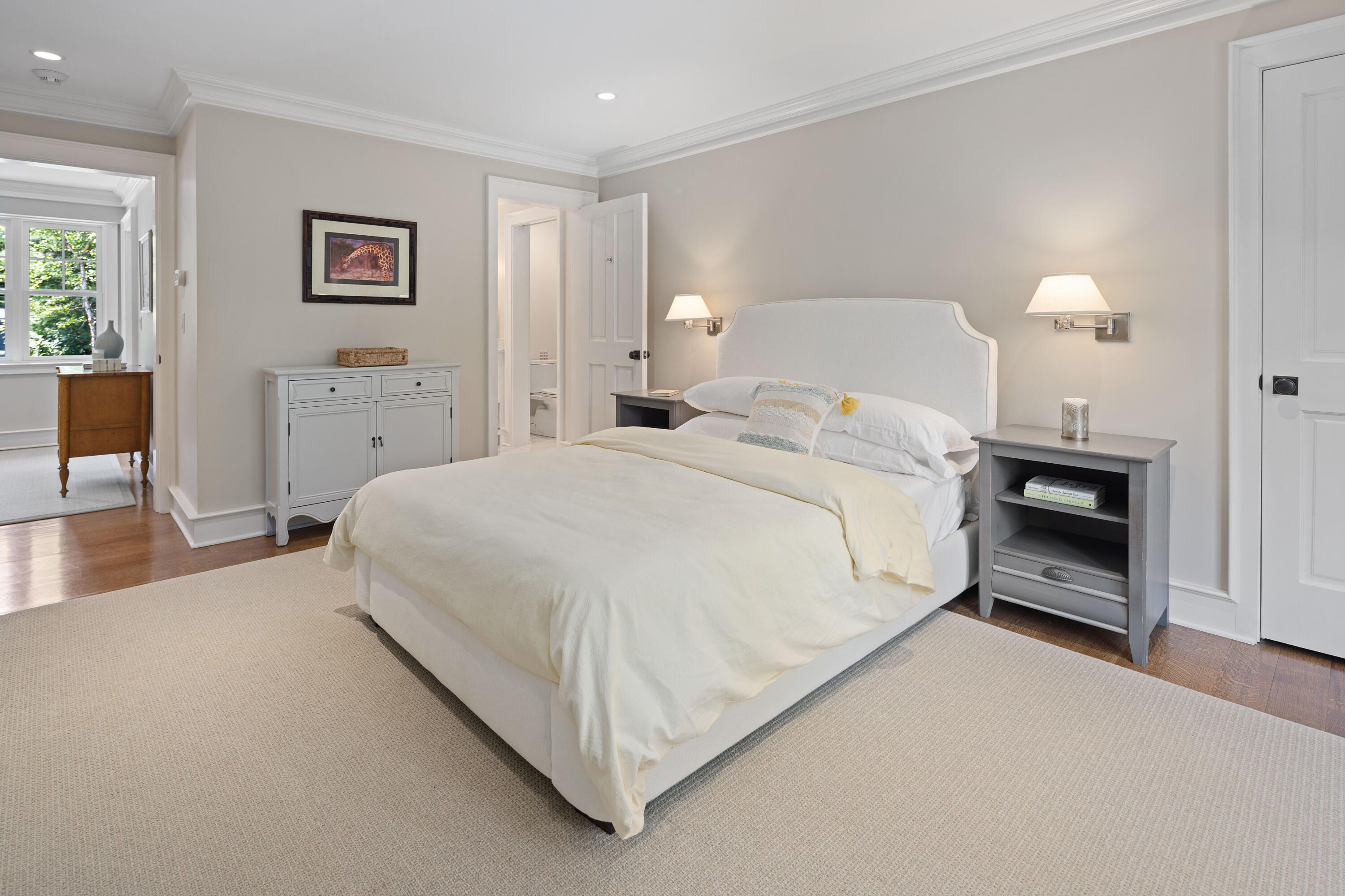 163 Chichester Road New Canaan, CT 06840 - Photo 20 of 40 a large white bed in a white room