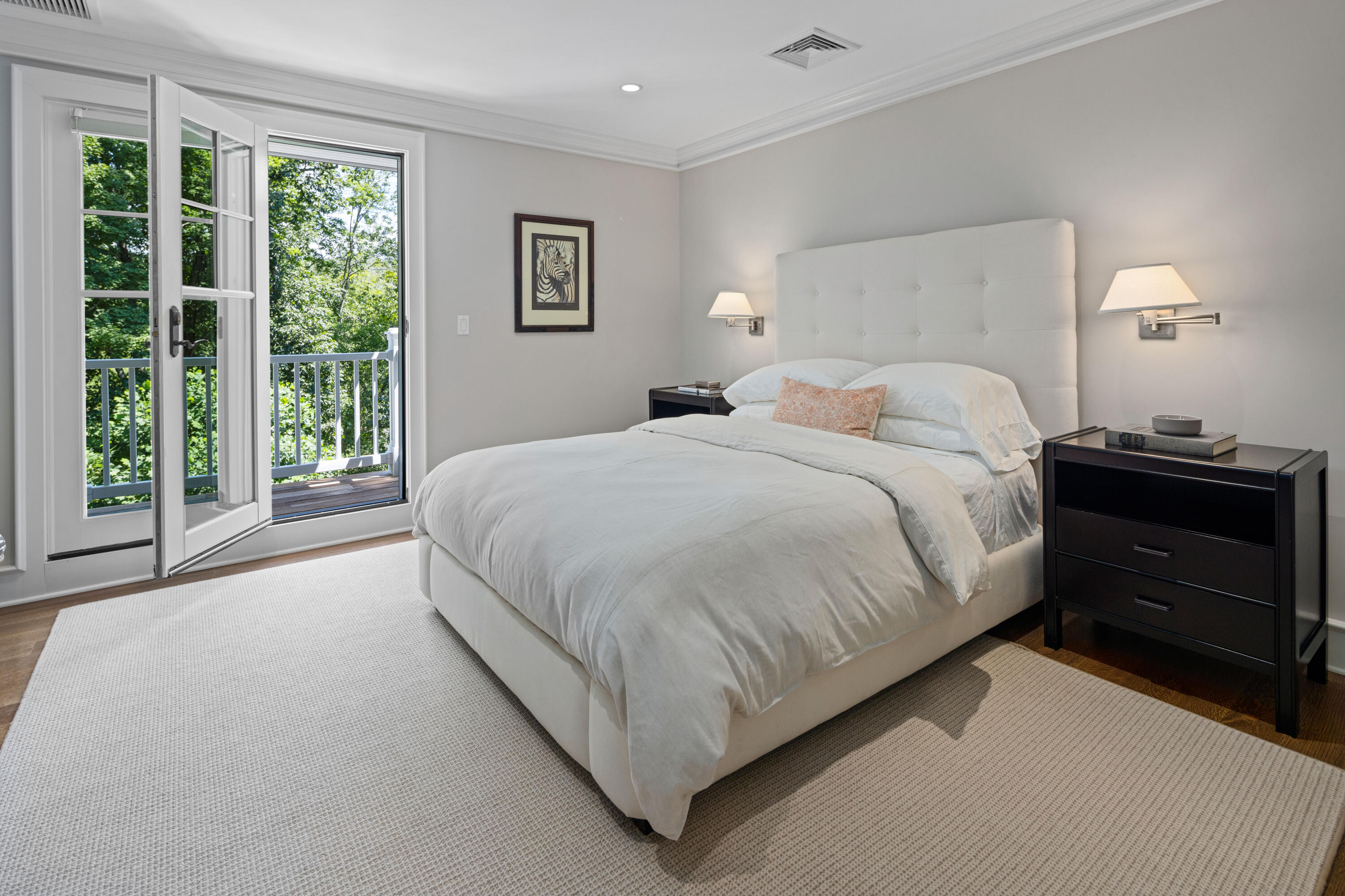 163 Chichester Road New Canaan, CT 06840 - Photo 21 of 40 a bedroom with a bed and a window