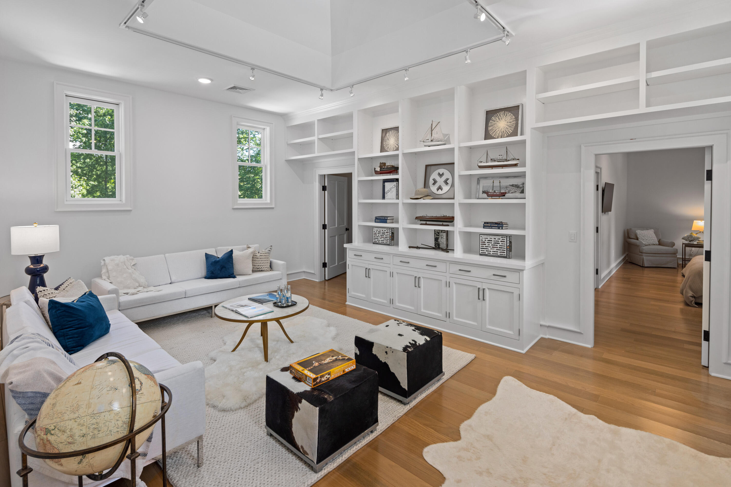 163 Chichester Road New Canaan, CT 06840 - Photo 22 of 40 a living room with furniture and a wooden floor