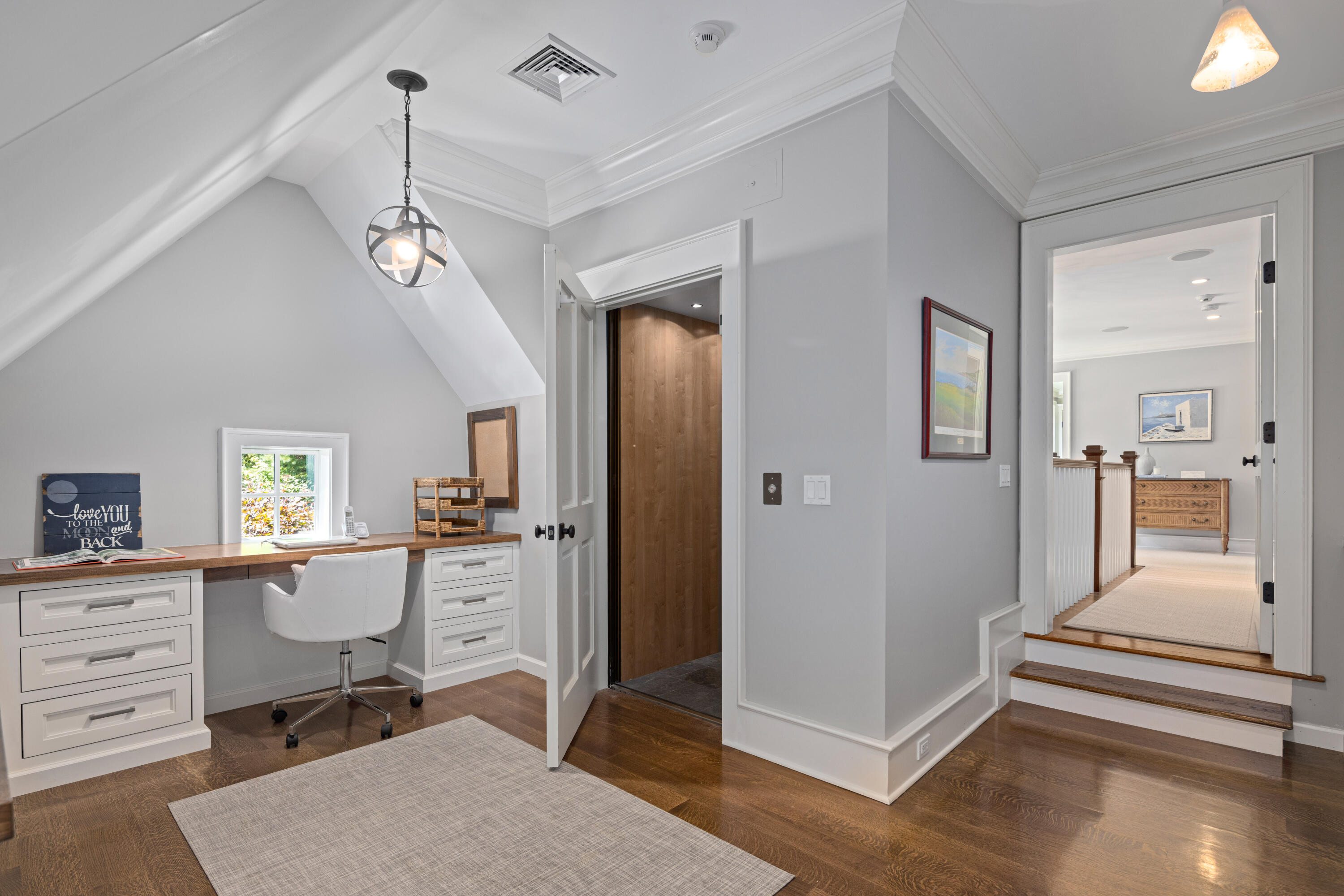 163 Chichester Road New Canaan, CT 06840 - Photo 23 of 40 a workspace with wooden floor and windows