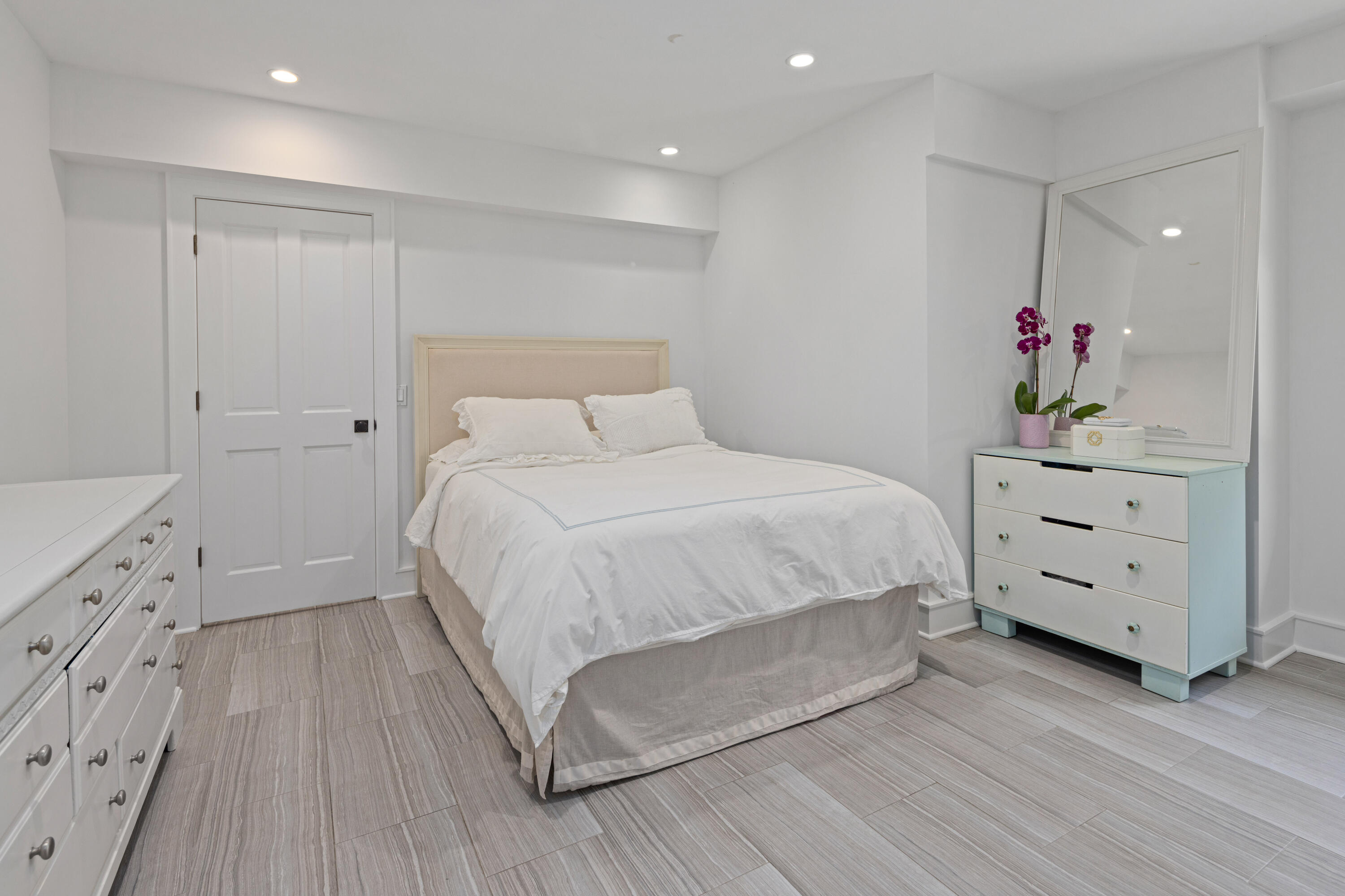 163 Chichester Road New Canaan, CT 06840 - Photo 33 of 40 a bedroom with a bed and a dresser