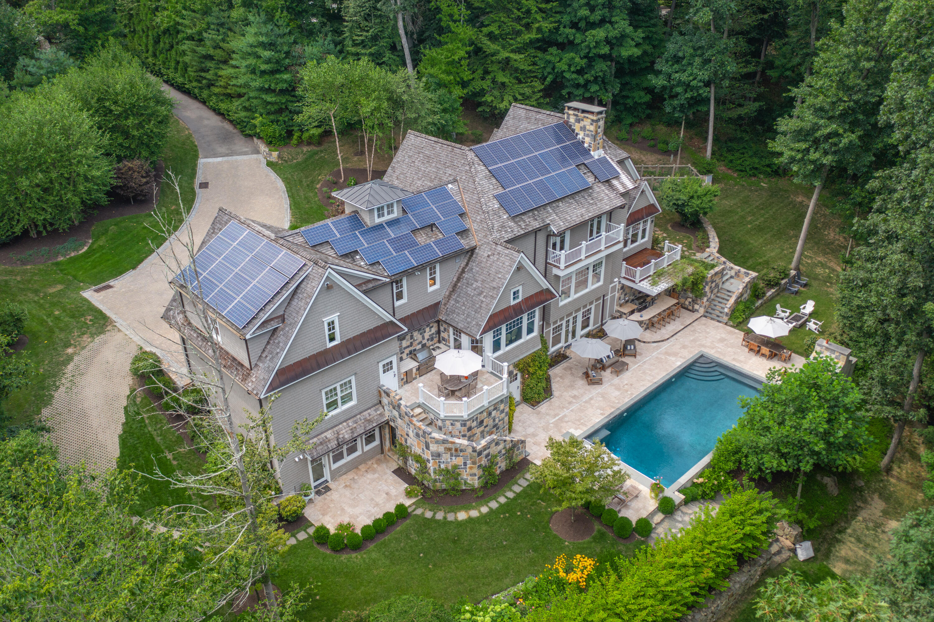 163 Chichester Road New Canaan, CT 06840 - Photo 39 of 40 an aerial view of a house with a garden