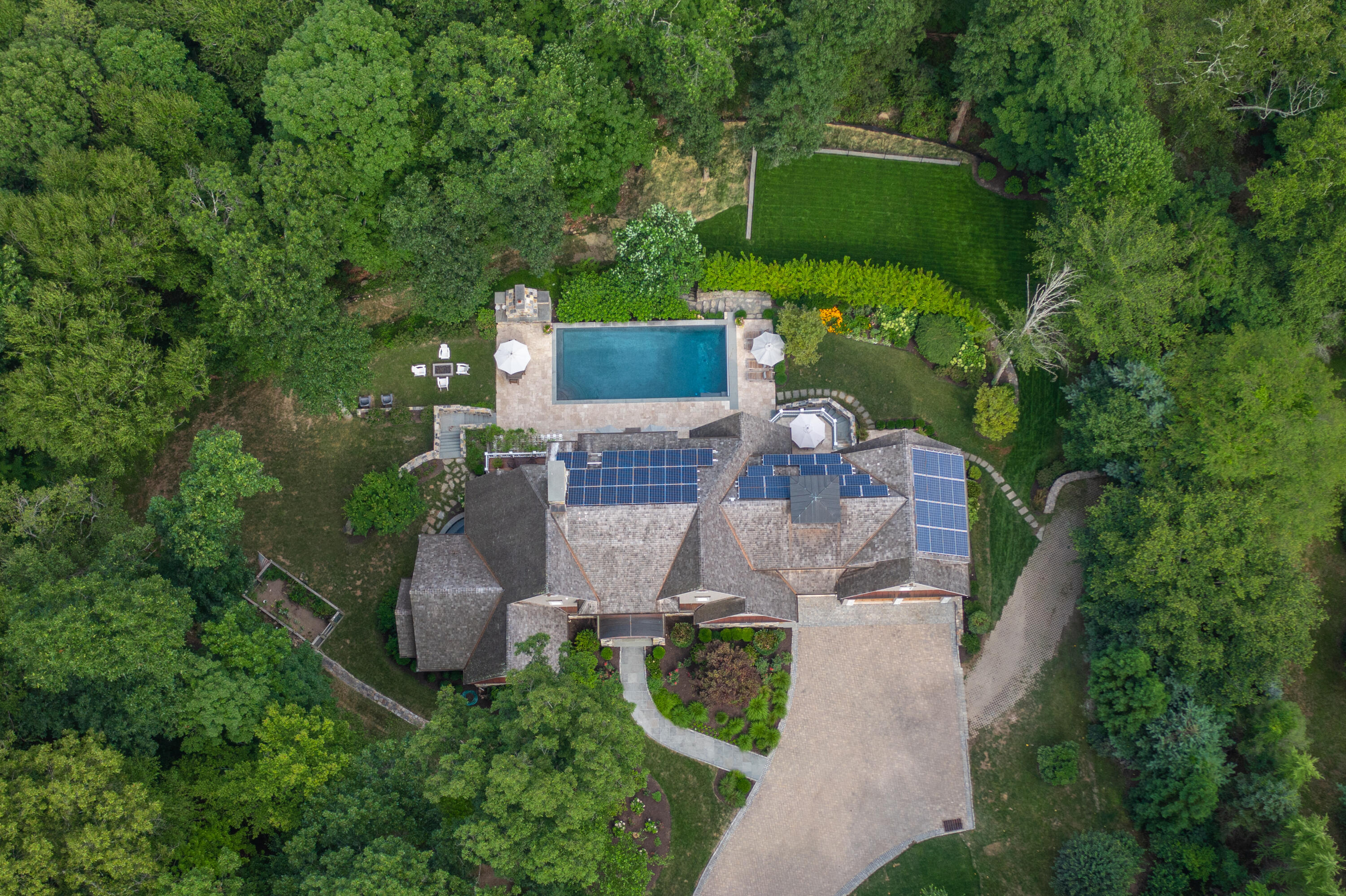 163 Chichester Road New Canaan, CT 06840 - Photo 40 of 40 an aerial view of a house with outdoor space