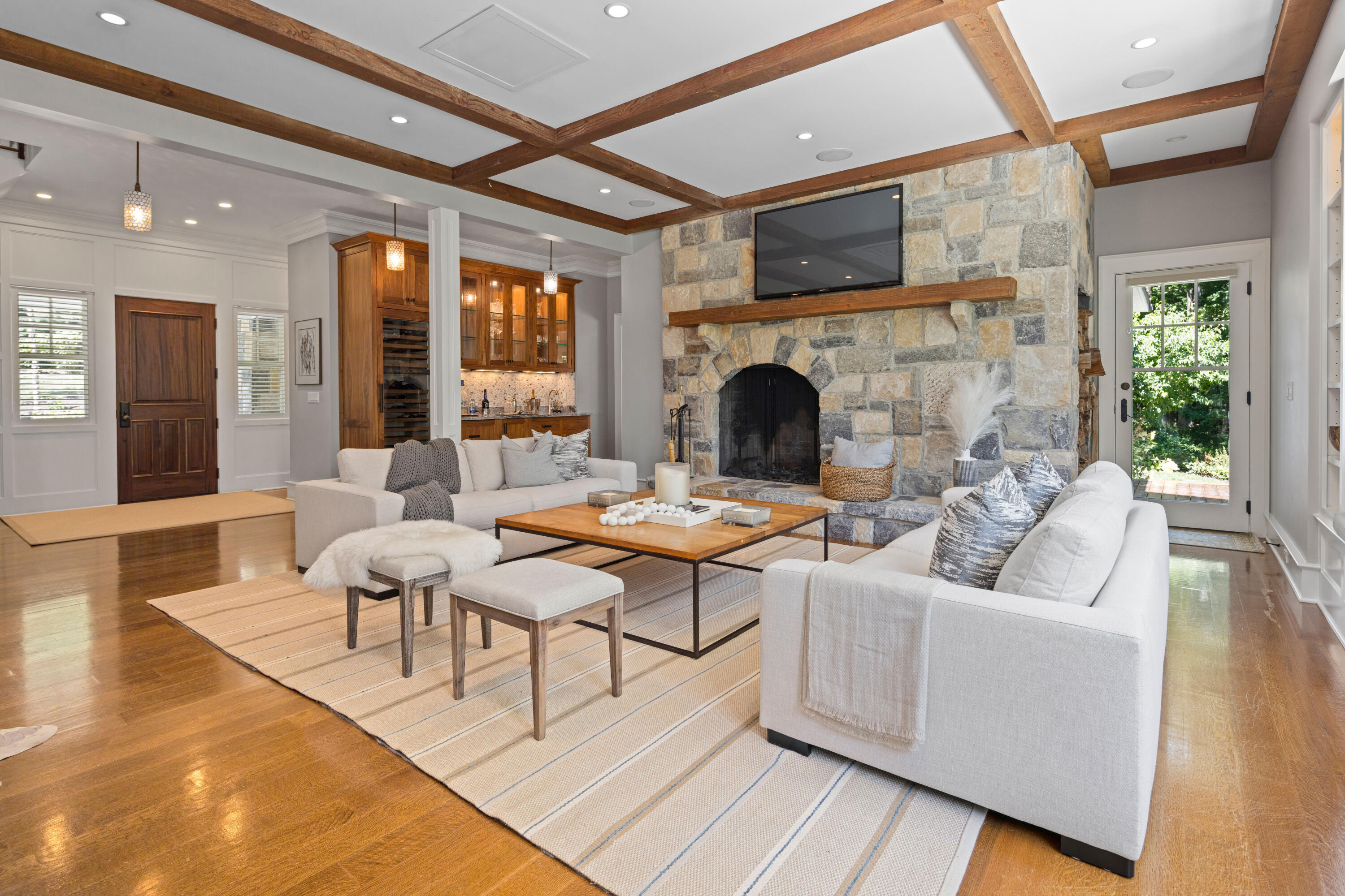 163 Chichester Road New Canaan, CT 06840 - Photo 7 of 40 a living room with furniture a fireplace and a flat screen tv