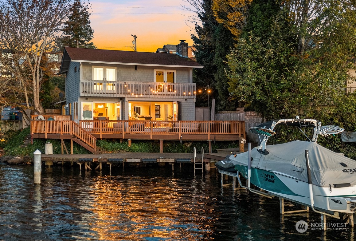 3901 Lake Washington Boulevard North Renton, WA 98056 - Photo 1 of 31 a view of house with swimming pool and seating space
