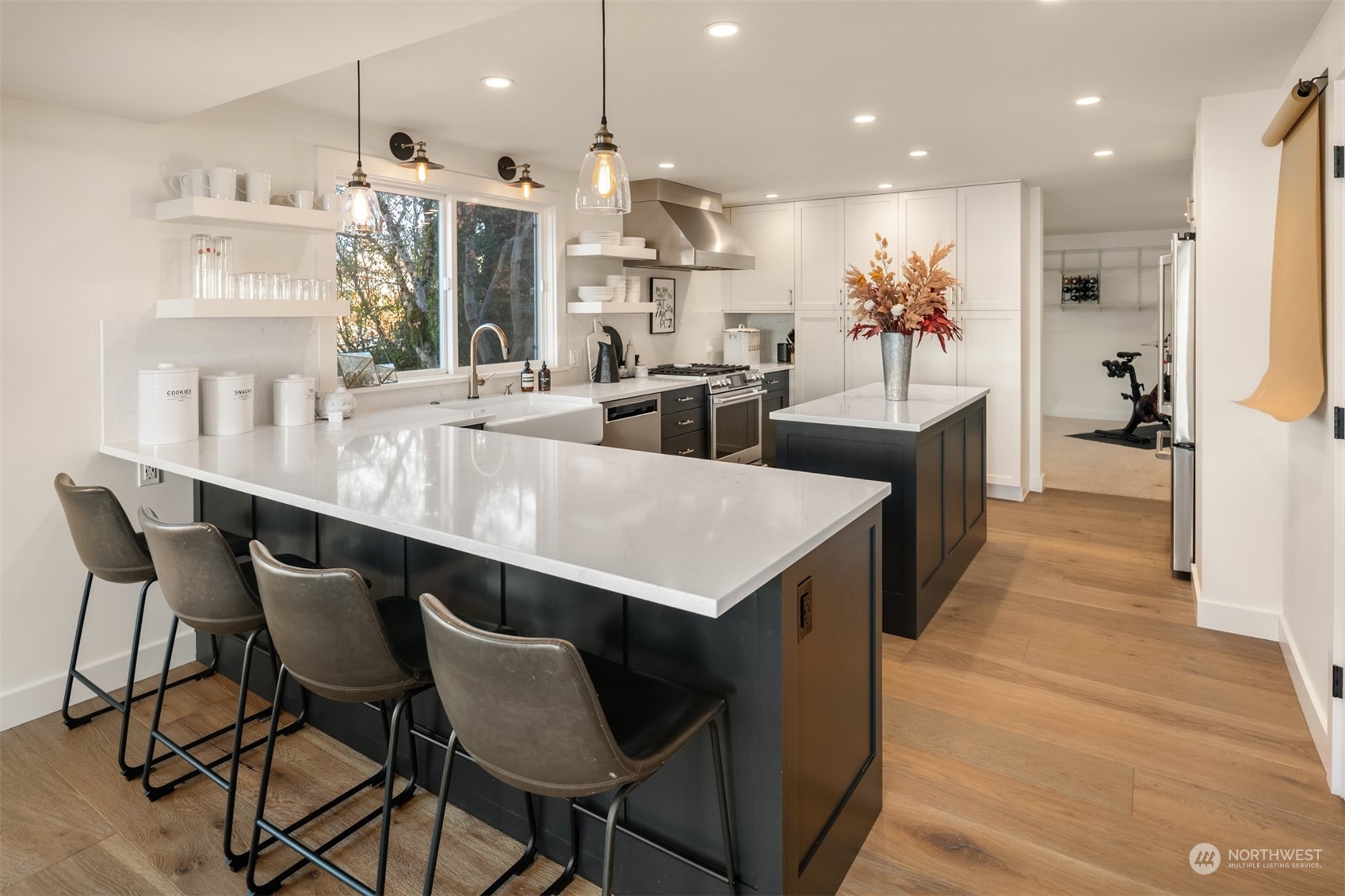 3901 Lake Washington Boulevard North Renton, WA 98056 - Photo 15 of 31 a large kitchen with a table and chairs