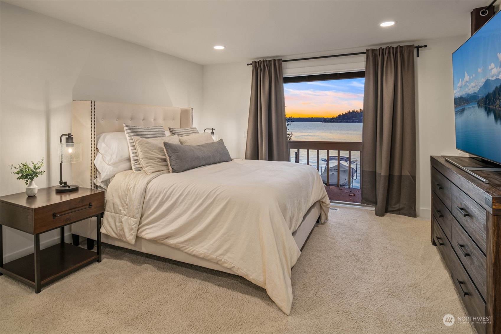 3901 Lake Washington Boulevard North Renton, WA 98056 - Photo 22 of 31 a bedroom with a bed and a window