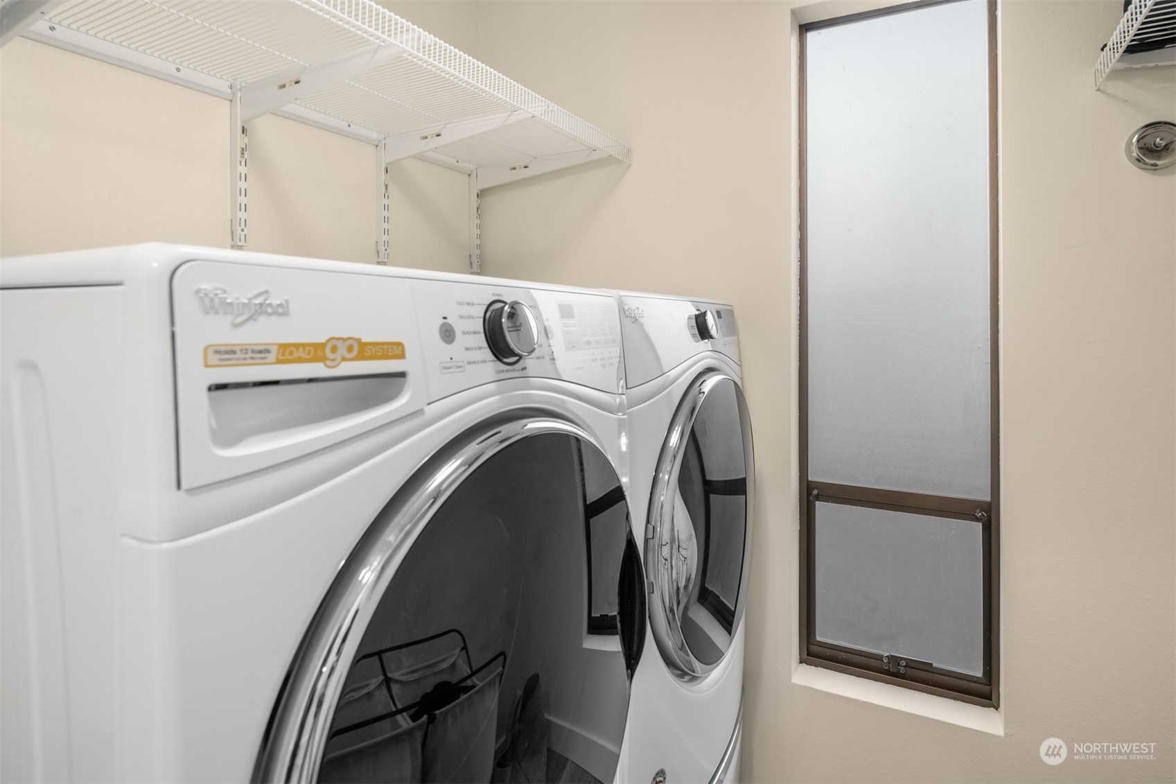 3901 Lake Washington Boulevard North Renton, WA 98056 - Photo 23 of 31 a utility room with dryer and washer