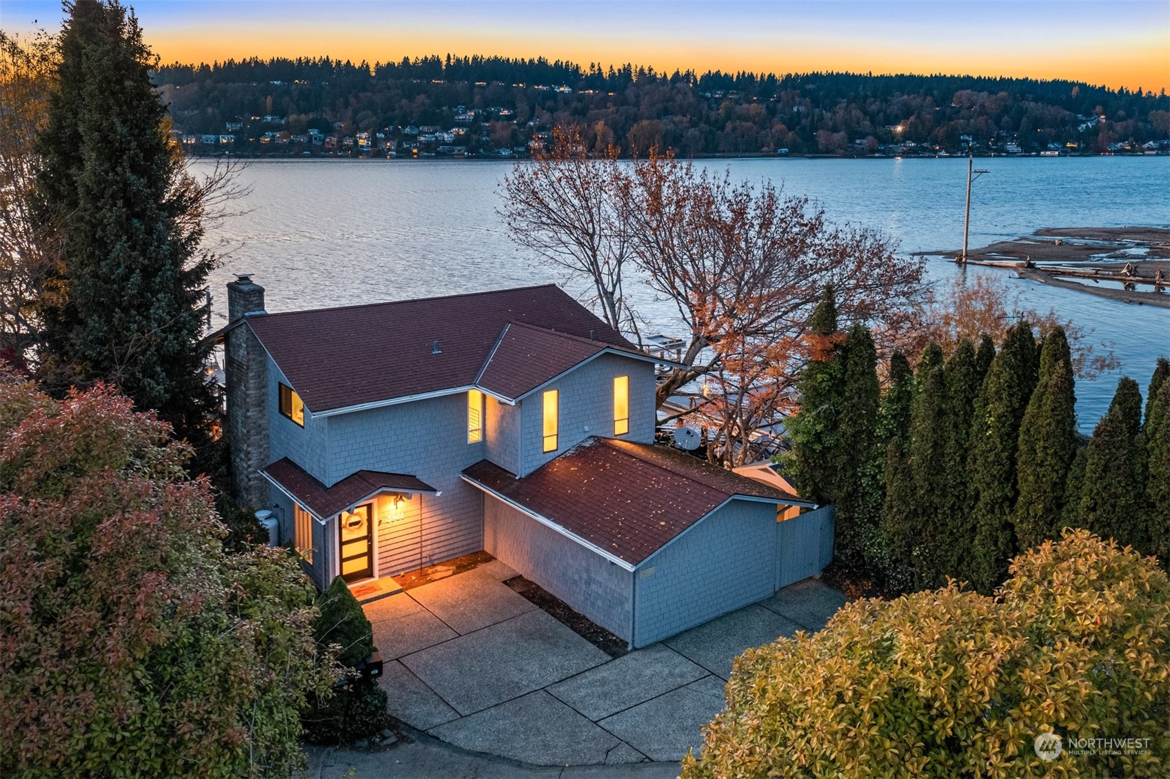3901 Lake Washington Boulevard North Renton, WA 98056 - Photo 28 of 31 a view of a house with a yard