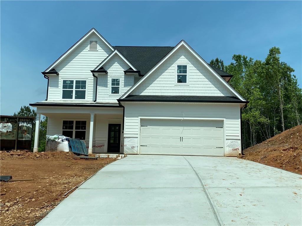 238 Observation Pointe Dallas, GA 30132 - Photo 1 of 1 a front view of a house with a yard and garage