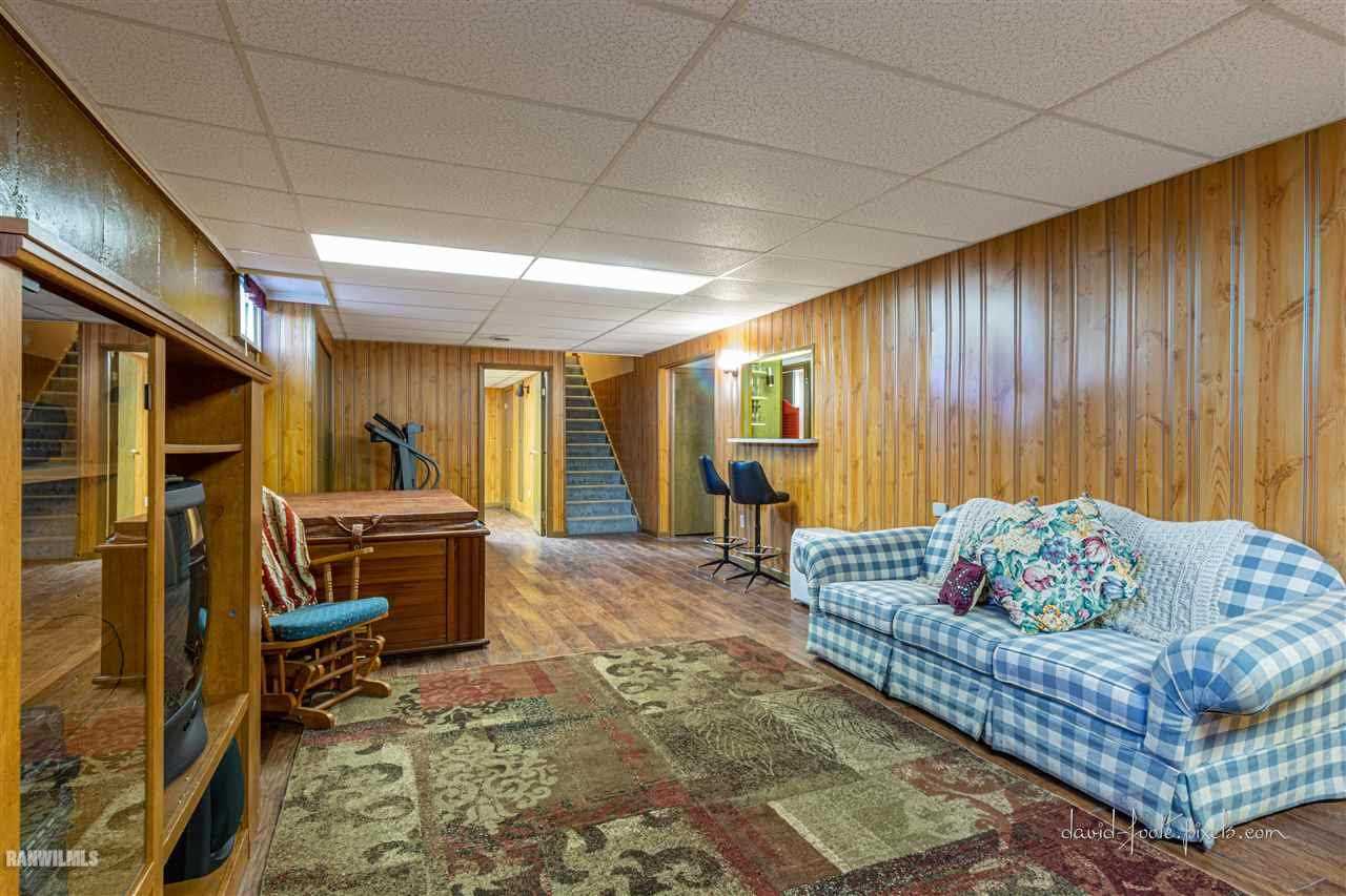 2796 West Hanover Road Hanover, IL 61041 - Photo 15 of 39 a living room with furniture and a window