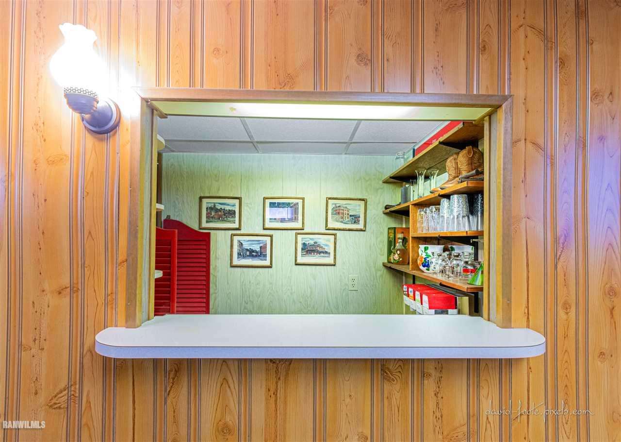 2796 West Hanover Road Hanover, IL 61041 - Photo 17 of 39 a room with painting and a table