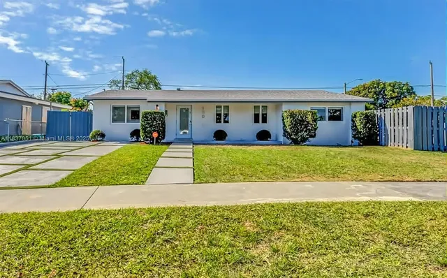 a view of a house with a swimming pool